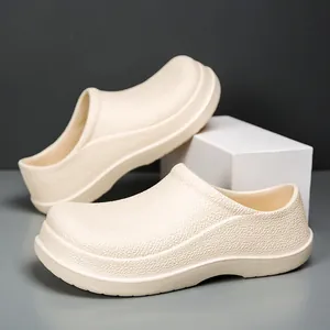 Detailed view of beige non-slip EVA work shoes with textured finish and thick sole