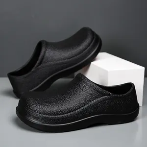 Macro detail of black non-slip chef shoes with EVA texture on minimalist display