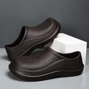 Macro detail of dark brown waterproof chef shoes showing high-quality EVA leather texture