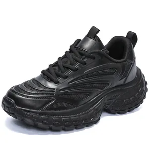 Men's chunky black platform sneakers with breathable mesh panels and rugged grip soles