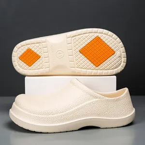 Close-up of lightweight non-slip EVA chef shoes sole with orange anti-skid patch