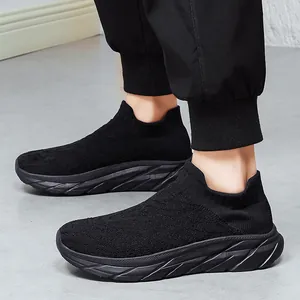 Men's all-black flyknit sock sneakers with thick sole and breathable slip-on design