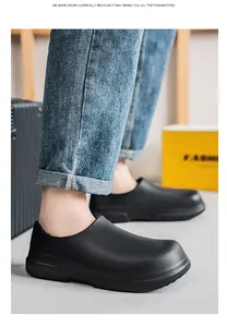 Rear view of black waterproof chef shoes showing slip-resistant texture and thick sole