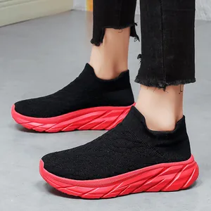 Breathable knit sock sneakers for men and women featuring thick red anti-slip soles