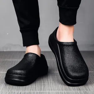 Close-up of black non-slip chef shoes showing waterproof rubber texture and sole detail