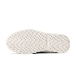 Detailed view of cream rubber herringbone non-slip sole for men's casual oxford shoes