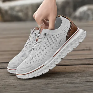 Men's breathable light grey loafers with shock-absorbing thick white soles and brown leather trim