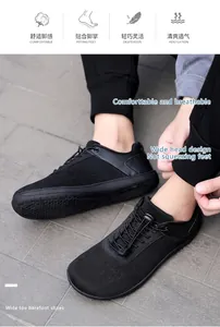Detail view of breathable wide-toe barefoot sneakers with elastic lacing and mesh upper