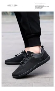 On-foot shot of black barefoot sneakers featuring breathable mesh and toggle lacing