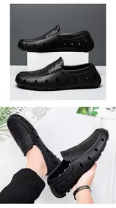 Macro shot of black waterproof EVA loafers with breathable holes for summer outdoor wear