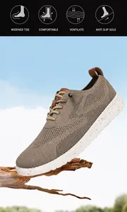 Nahaufnahme des atmungsaktiven Mesh-Obermaterials und der Lederlasche am leichten Schuh