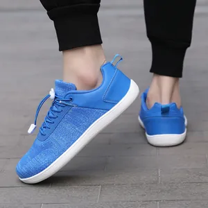 Breathable blue barefoot sports shoes with mesh upper and quick-lace bungee system