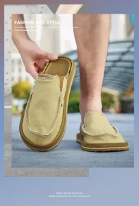 Detailed close-up of khaki canvas slip-on loafers featuring vintage frayed edge design