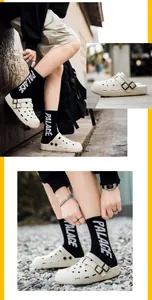 Detail view of cream platform clog sandals with adjustable double straps and breathable holes