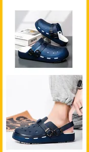 Detail view showing navy blue garden clogs with dual decorative straps and thick white footbed