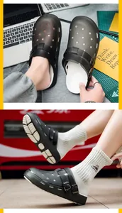 Detail view of dark grey hollow-out sandals with dual metal buckles and anti-slip white footbed