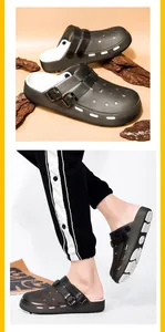 Detail view of hollow-out garden clogs featuring decorative metal double buckles and EVA sole
