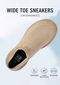 Ergonomic wide-toe beige mesh shoe showing breathable fabric and inner sizing detail