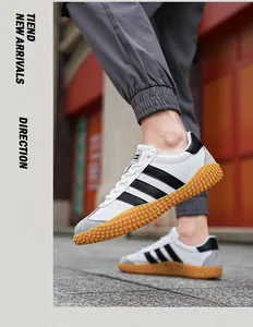 Detail shot of mesh sneaker with caramel rubber gum sole and non-slip traction pattern