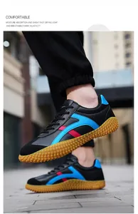 Detail klassischer Leder-Sneaker mit robuster Gummisohle und Streifen-Design