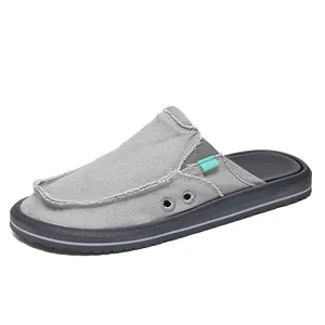 Men's breathable grey canvas mule sneakers with raw edge details and thick rubber sole
