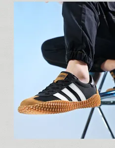 Close-up of retro mesh sneaker featuring brown gum rubber sole and suede texture