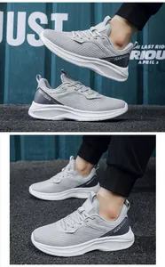Detailed side view of breathable mesh sneakers with shock-absorbing white soles and JGAK logo