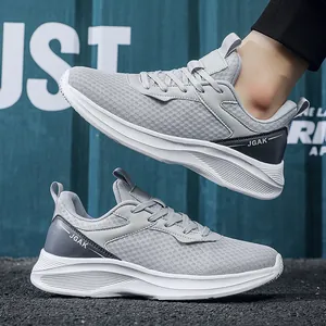 Men's breathable mesh running shoes in light grey with thick shock-absorbing soles