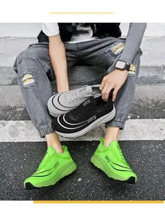 Drei Farben atmungsaktive Mesh-Laufschuhe für breite Füße in Neon, Schwarz und Grau