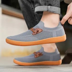 Men's breathable mesh slip-on sneakers with wide-toe fit and orange rubber sole