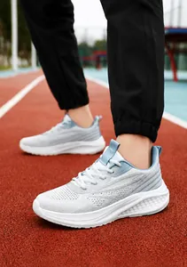Close-up of breathable mesh fabric and cushioned thick sole on these running sneakers