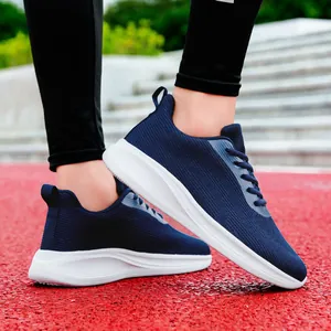 Chaussures sport respirantes bleu marine pour homme avec semelle amortissante blanche
