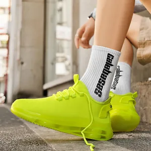 Scarpe da corsa verde neon in mesh traspirante con suole ammortizzate trasparenti