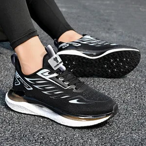 Lightweight breathable black mesh running shoes with cushioned soles and white fire patterns