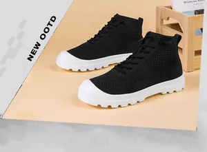 Detail of black knit high-top sneakers with thick white anti-slip soles for men and women