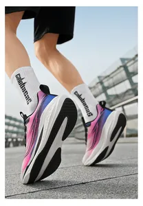 Dynamic low-angle shot of colorful retro gradient running shoes in outdoor action