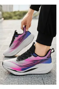 Detail of breathable mesh running shoes with vibrant pink and blue gradient and EVA sole
