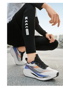 Close-up of lightweight breathable mesh running shoes with orange and blue wave details
