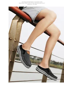 Detail of grey breathable slip-on loafers with durable sole in casual outdoor setting