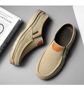 Detailed top view of khaki canvas loafers with slip-on design and anti-slip rubber soles
