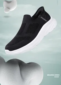 Close-up of black breathable mesh upper and thick white EVA cushioning sole