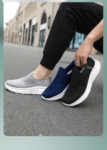 Detailed close-up of men's breathable slip-on walking shoes in gray, navy, and black colors