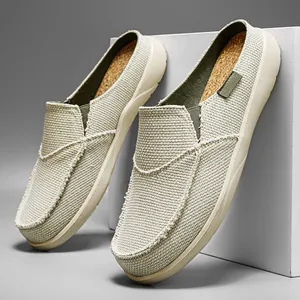 Mocassini sabot da uomo in tela beige con bordi sfrangiati e suola interna in sughero