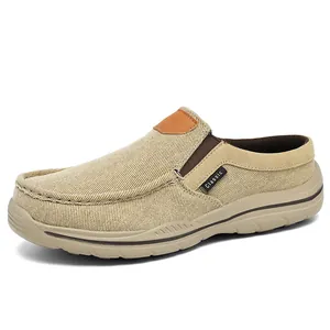 Men's khaki canvas slip-on loafers with thick rubber sole and Classic logo detail