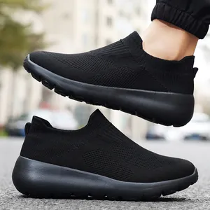 Lightweight black knit slip-on sneakers with breathable mesh upper and thick foam sole