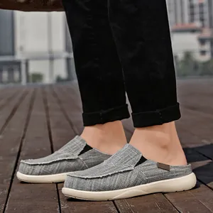 Grey canvas mule sneakers for men featuring a frayed edge and anti-slip white rubber sole