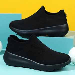 Lightweight black slip-on mesh sneakers with breathable knit upper and thick sole