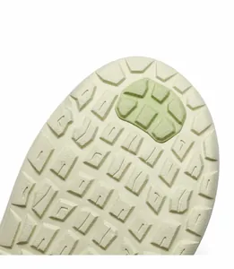 Detailed macro view of the anti-slip flexible rubber sole with drainage patterns