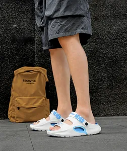 Foot model show of men's white and blue EVA beach sandals with side ventilation holes