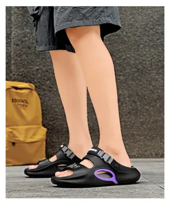 Detail of breathable men's water sandals with adjustable heel strap and purple accents